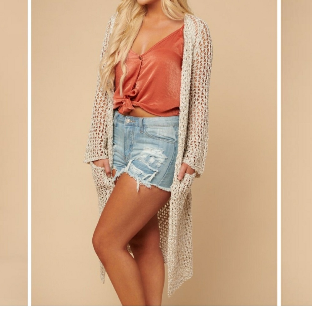 Long loose knit cardigan with pockets.